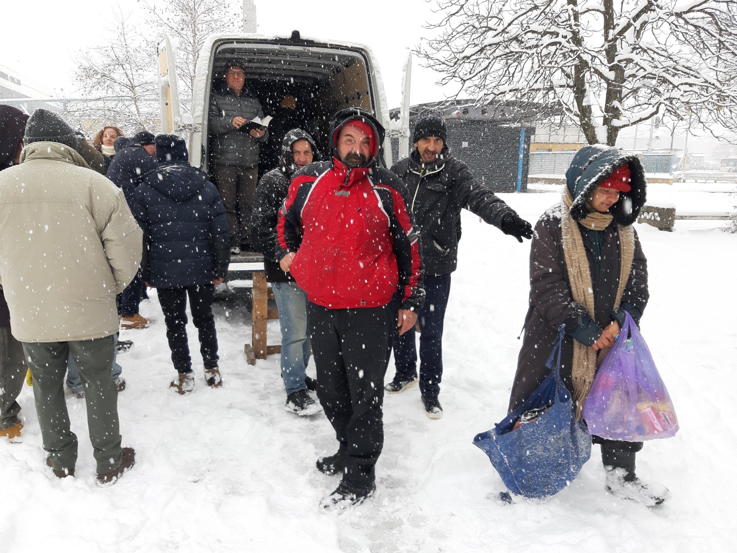 People getting supplies from Street Mercy Van